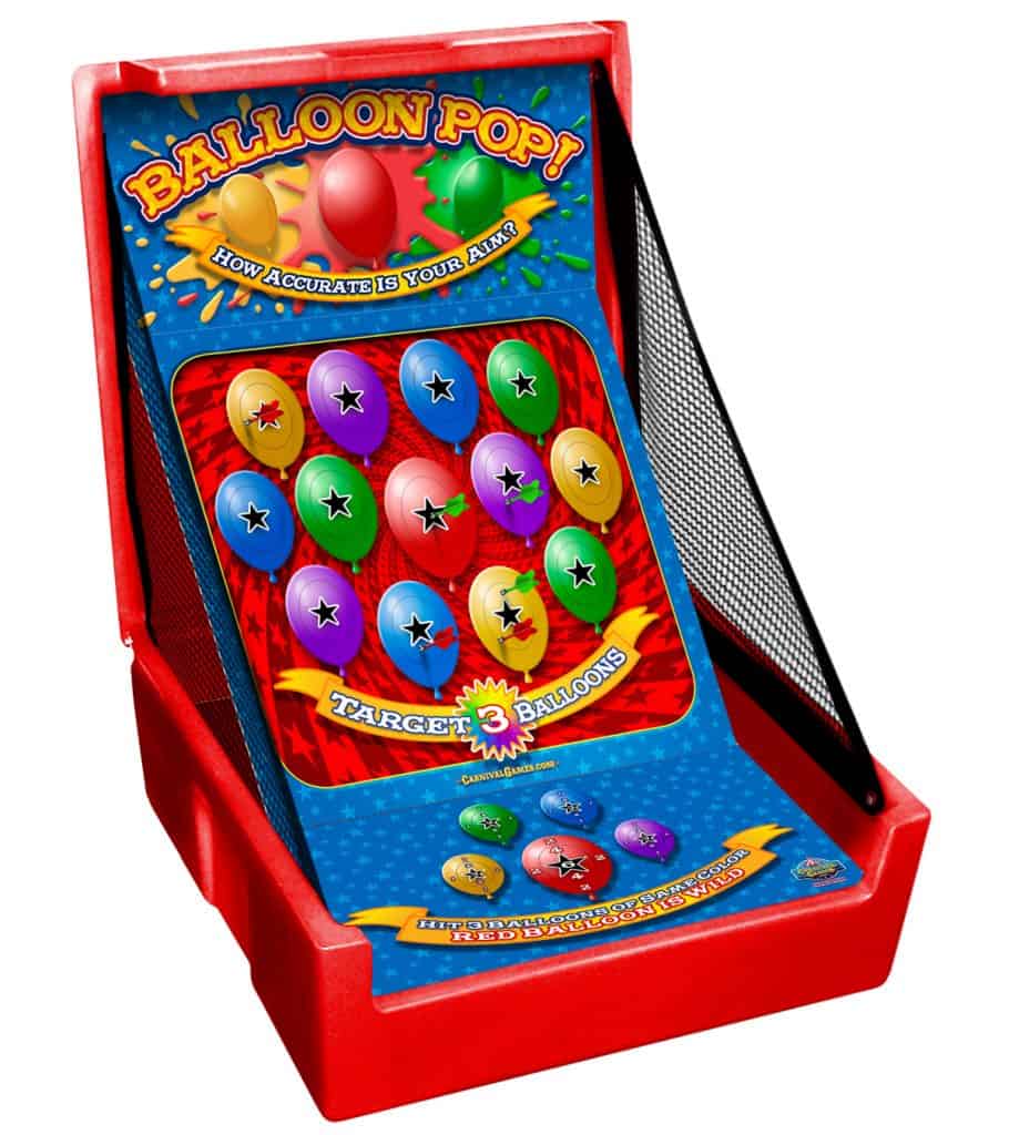 A colorful tabletop game called "Balloon Pop!" is perfect for NY party rentals Long Island, featuring a red frame, perforated balloons with star targets, and the goal "Target 3 Balloons" printed on a blue background. Mesh netting secures the sides.