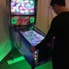 person playing pinball