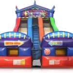 Colorful inflatable funhouse slide with "Funhouse Super Slide" sign at the top, two slides, a central blue climbing ladder, and entrances labeled "Enter Here" and "Fun This Way"—perfect for party rentals Long Island celebrations.