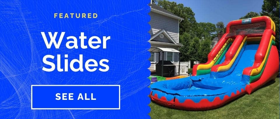 Colorful inflatable water slide set up on grass in a backyard, with a house in the background. Perfect for party rentals Long Island! Text on a blue graphic reads, "Featured Water Slides. See All.