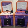 Two side-by-side purple and orange arcade-style games with digital displays, microphones, and signage reading, "It's more than a bank account. It's taking the leap on your business." Mercury branding is visible.