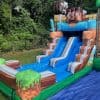 A large inflatable minecraft slide with a castle.