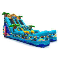 A large, blue inflatable water slide with tropical designs, palm trees, and a "Beach" sign at the top. The slide features wave patterns, floral decorations, and curves downward into a splash pool.