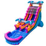 Inflatable water slide with bright blue, pink, orange, and purple colors, featuring palm tree decorations, a climbing area, and a large splash pool at the bottom.